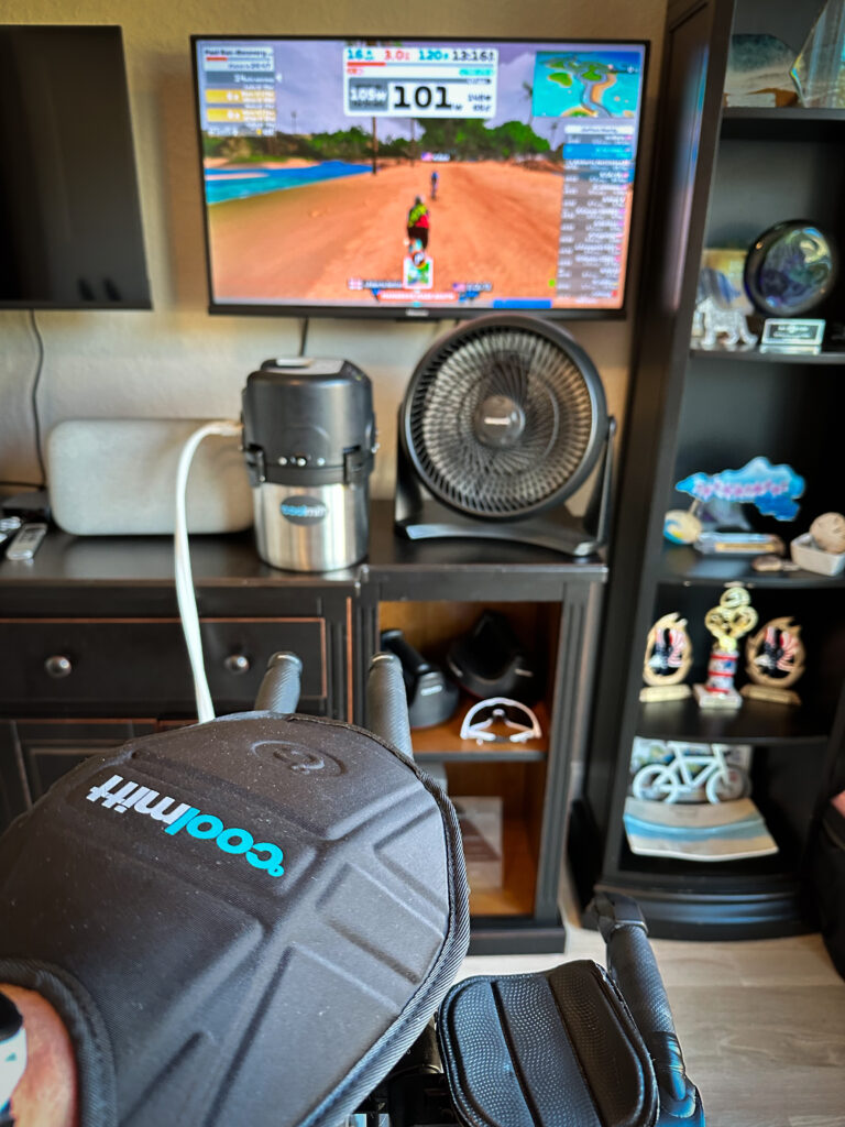 The Cool Mitt device with Zwift in the background.