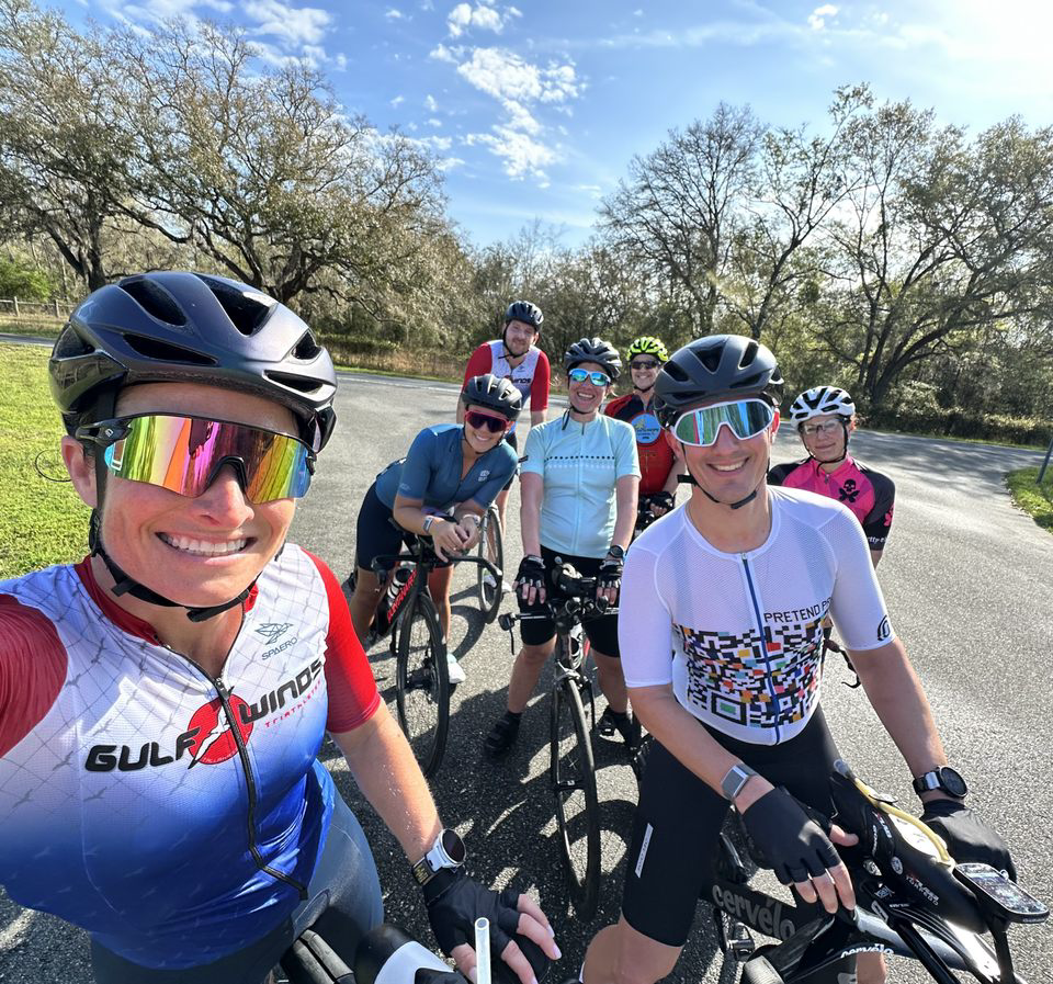 a group of triathletes out on a bike ride