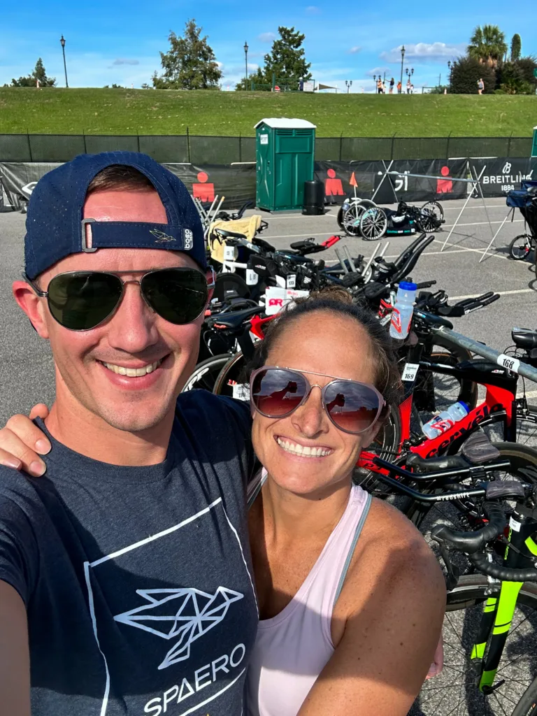 A male and female in transition of a triathlon